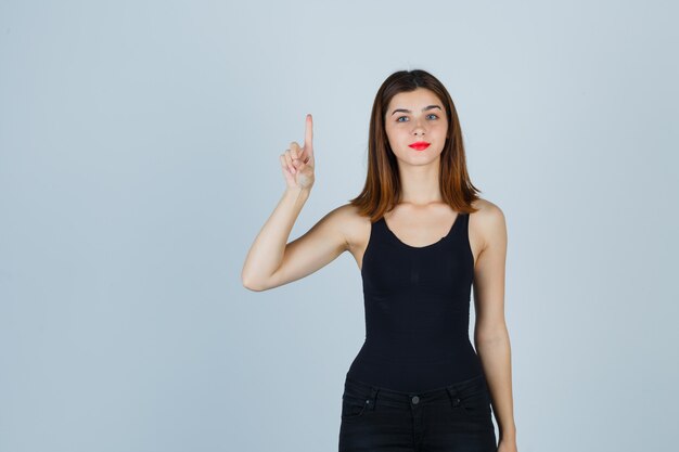 Expressive young woman posing in the studio