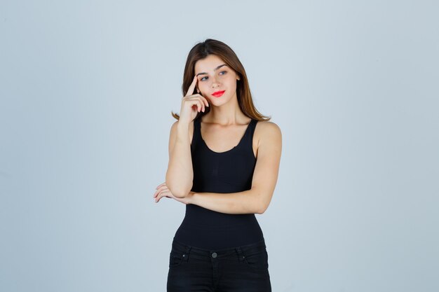 Expressive young woman posing in the studio