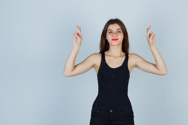 Expressive young woman posing in the studio