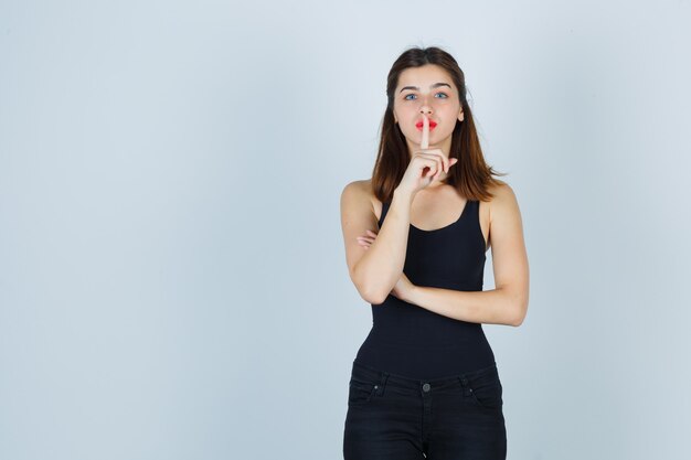 Expressive young woman posing in the studio