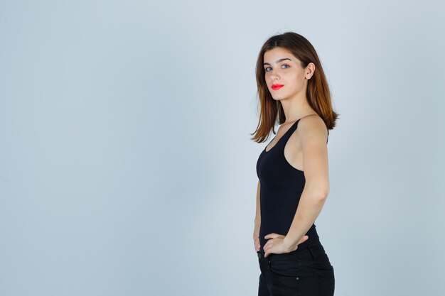 Expressive young woman posing in the studio