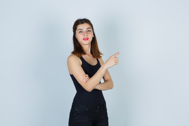 Expressive young woman posing in the studio