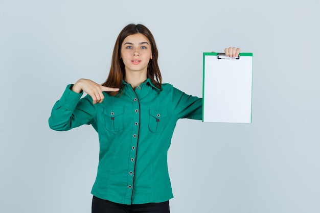 Expressive young woman posing in the studio