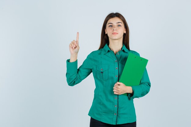 Expressive young woman posing in the studio