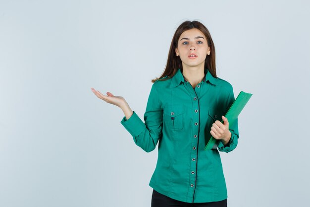 Expressive young woman posing in the studio