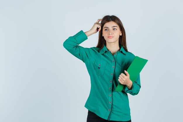 Expressive young woman posing in the studio