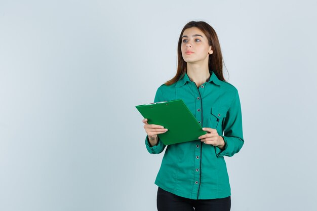 Expressive young woman posing in the studio