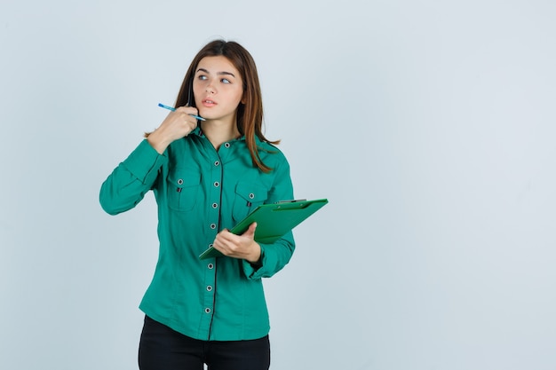 Expressive young woman posing in the studio