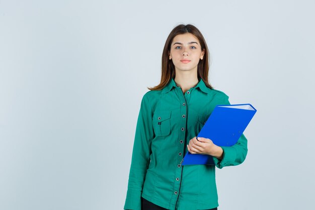 Expressive young woman posing in the studio