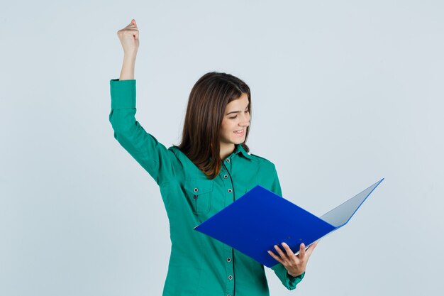 Expressive young woman posing in the studio