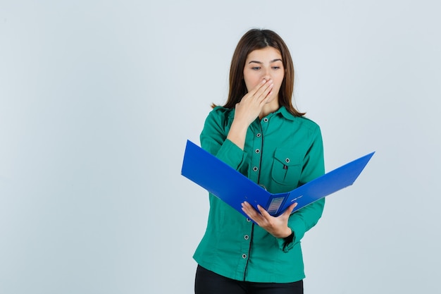 Expressive young woman posing in the studio