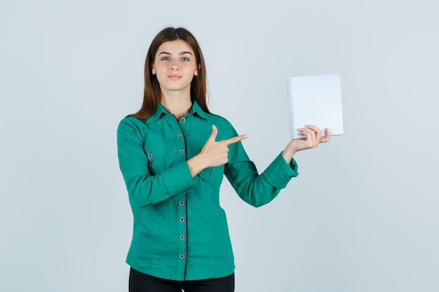 Expressive young woman posing in the studio