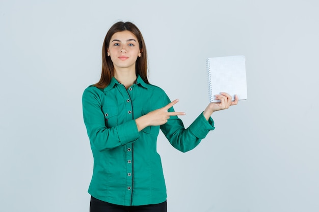 Expressive young woman posing in the studio