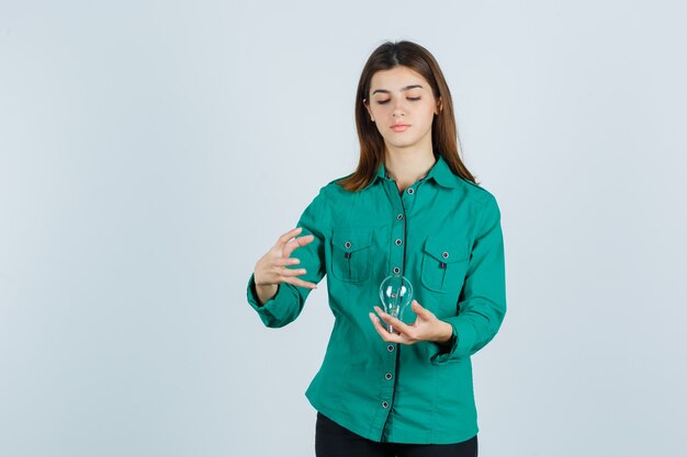 Expressive young woman posing in the studio