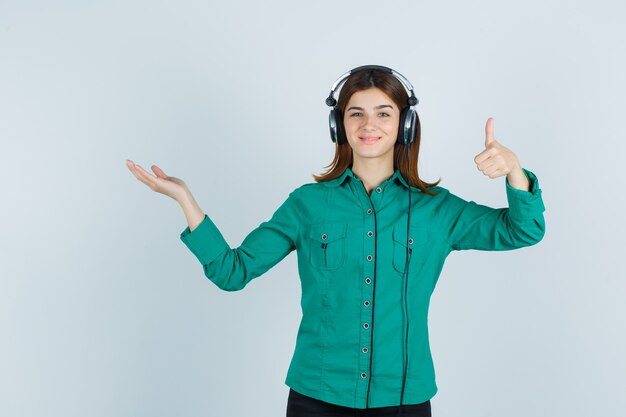 Expressive young woman posing in the studio