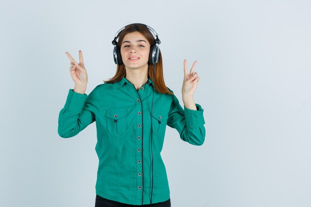 Expressive young woman posing in the studio