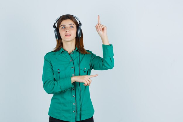 Expressive young woman posing in the studio