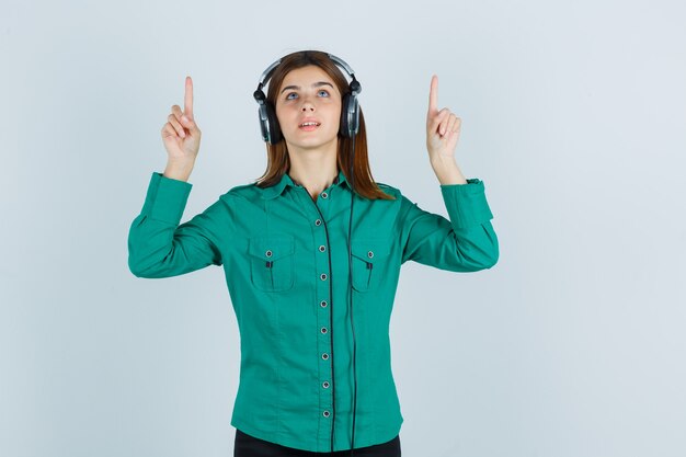 Expressive young woman posing in the studio