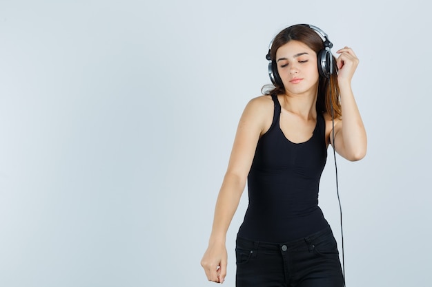 Expressive young woman posing in the studio