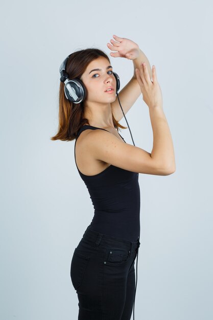 Expressive young woman posing in the studio