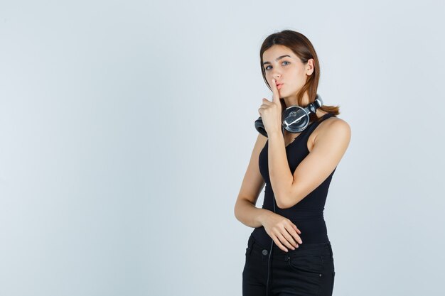 Expressive young woman posing in the studio