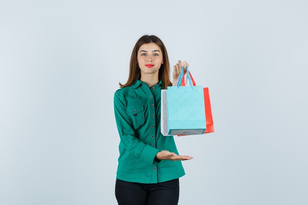 Expressive young woman posing in the studio