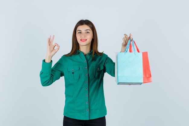 Expressive young woman posing in the studio