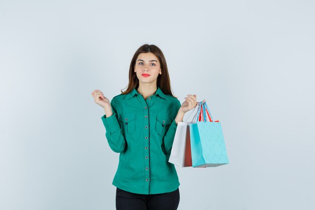 Expressive young woman posing in the studio