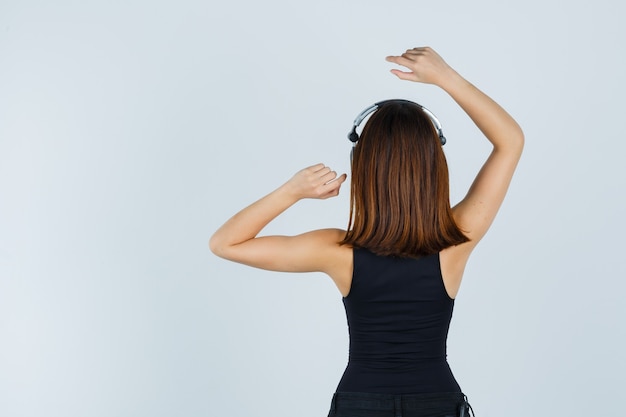 Expressive young woman posing in the studio