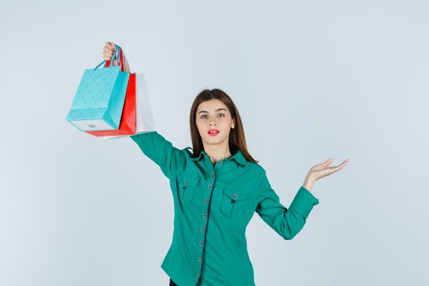 Expressive young woman posing in the studio