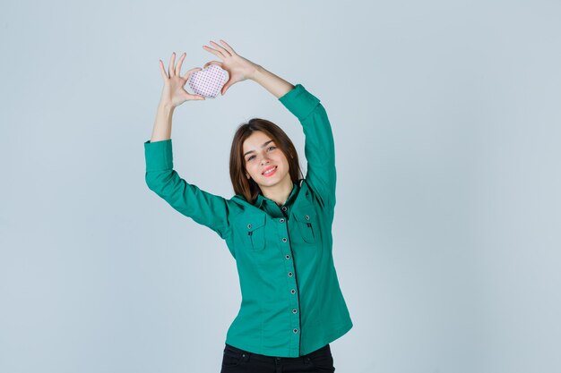 Expressive young woman posing in the studio