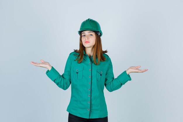 Expressive young woman posing in the studio