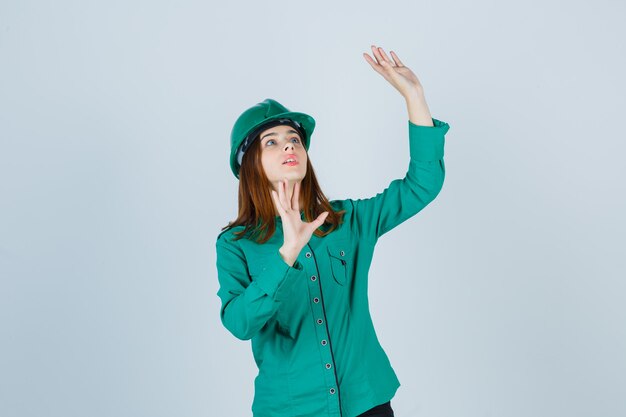 Expressive young woman posing in the studio