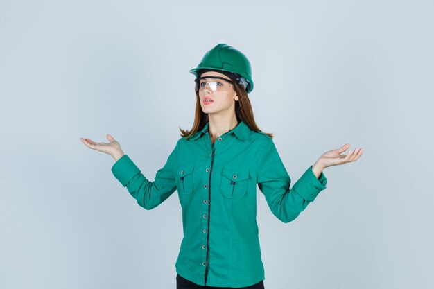 Expressive young woman posing in the studio