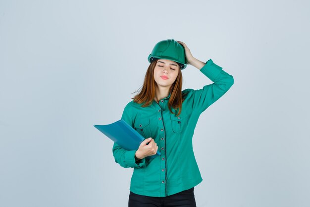 Expressive young woman posing in the studio