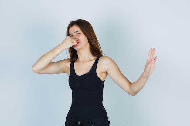 Expressive young woman posing in the studio