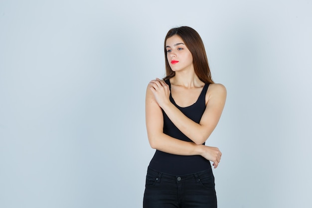 Expressive young woman posing in the studio