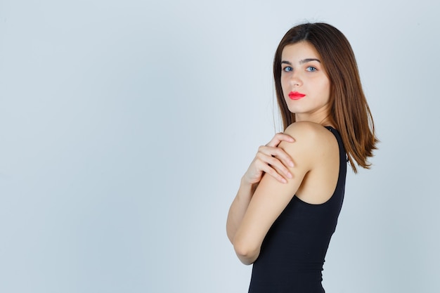 Expressive young woman posing in the studio