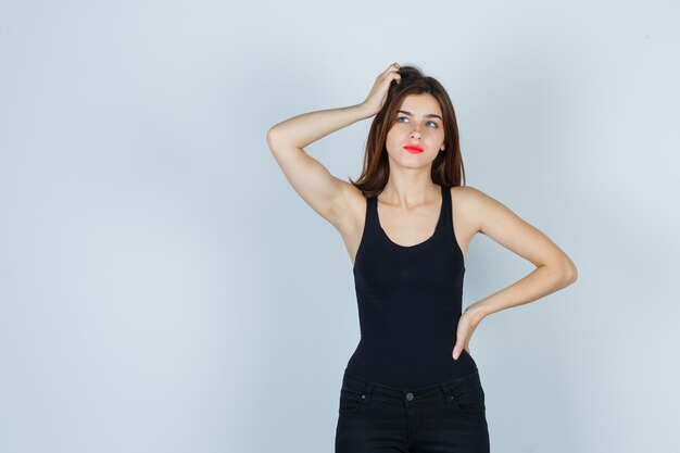 Expressive young woman posing in the studio