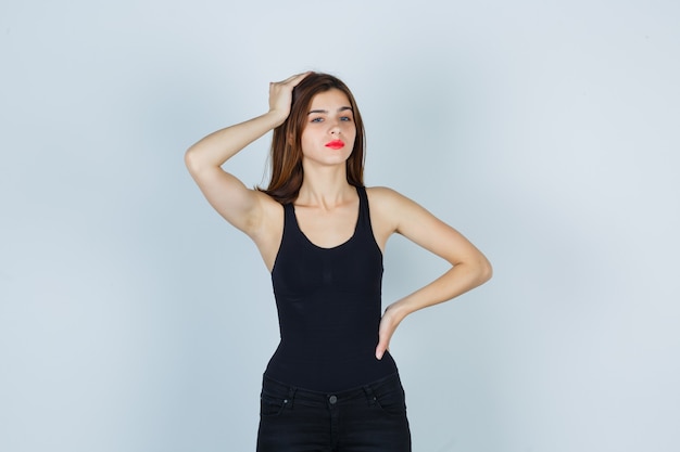 Expressive young woman posing in the studio