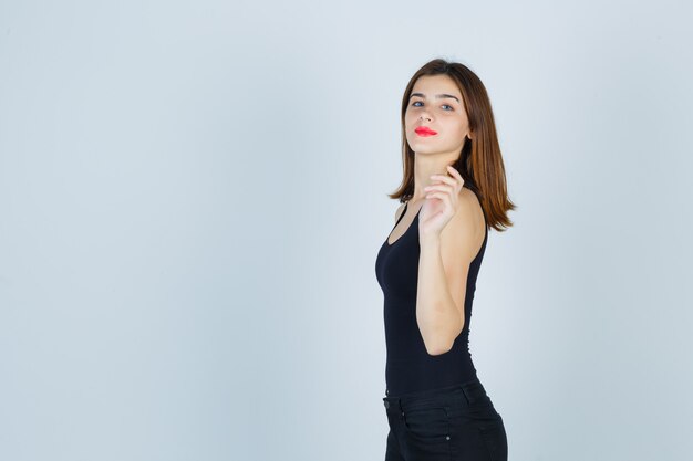 Expressive young woman posing in the studio