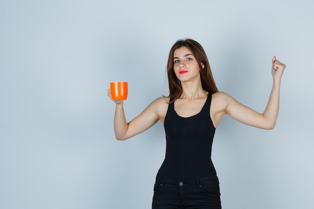 Expressive young woman posing in the studio