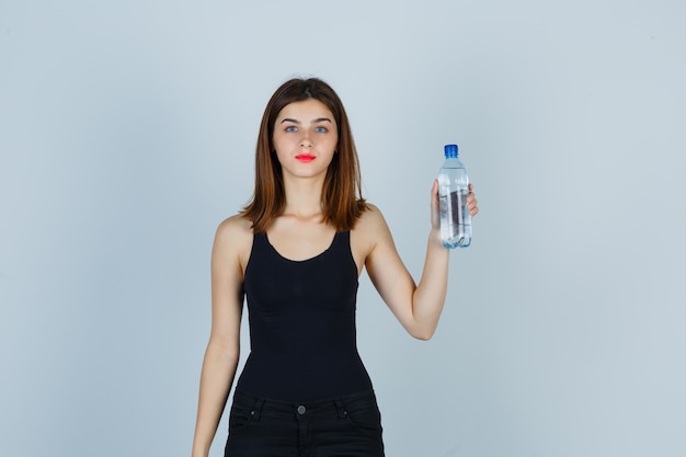 Expressive young woman posing in the studio