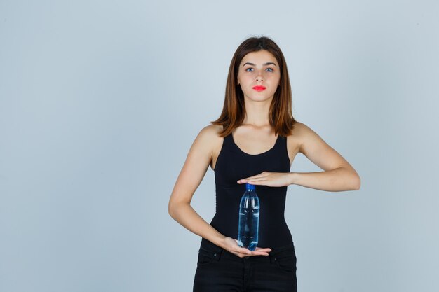 Expressive young woman posing in the studio