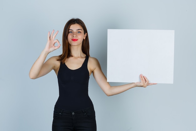 Expressive young woman posing in the studio