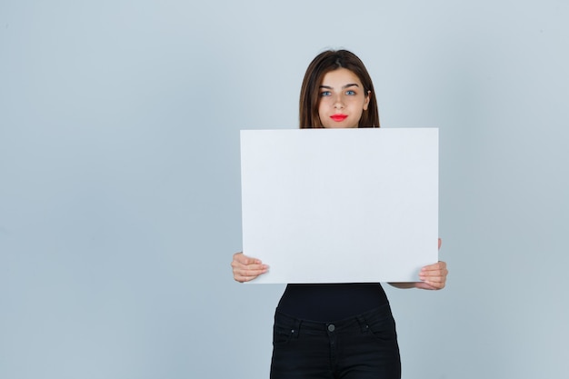 Expressive young woman posing in the studio