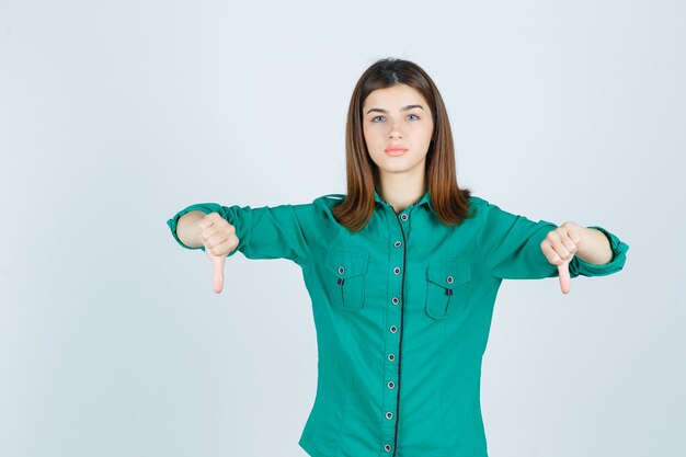 Expressive young woman posing in the studio