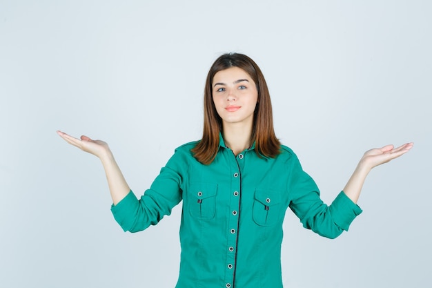 Expressive young woman posing in the studio