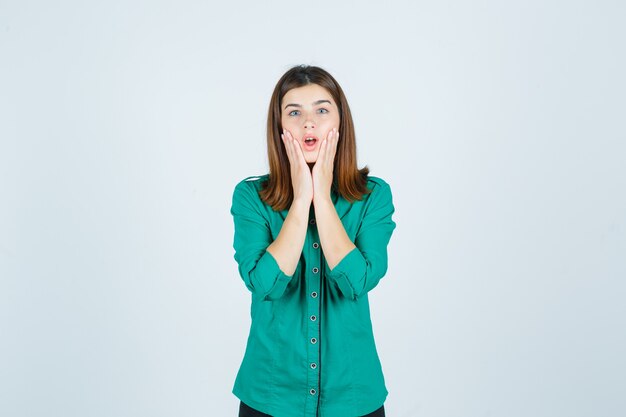 Expressive young woman posing in the studio