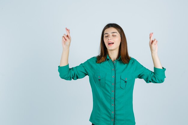 Expressive young woman posing in the studio